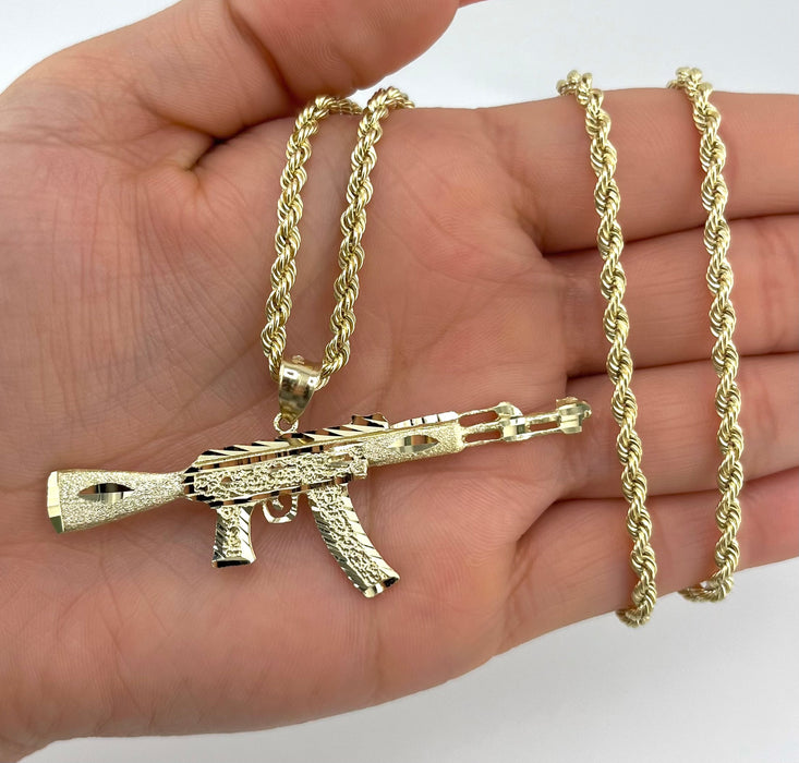 14k Gold Gun Chain Set . P42-18