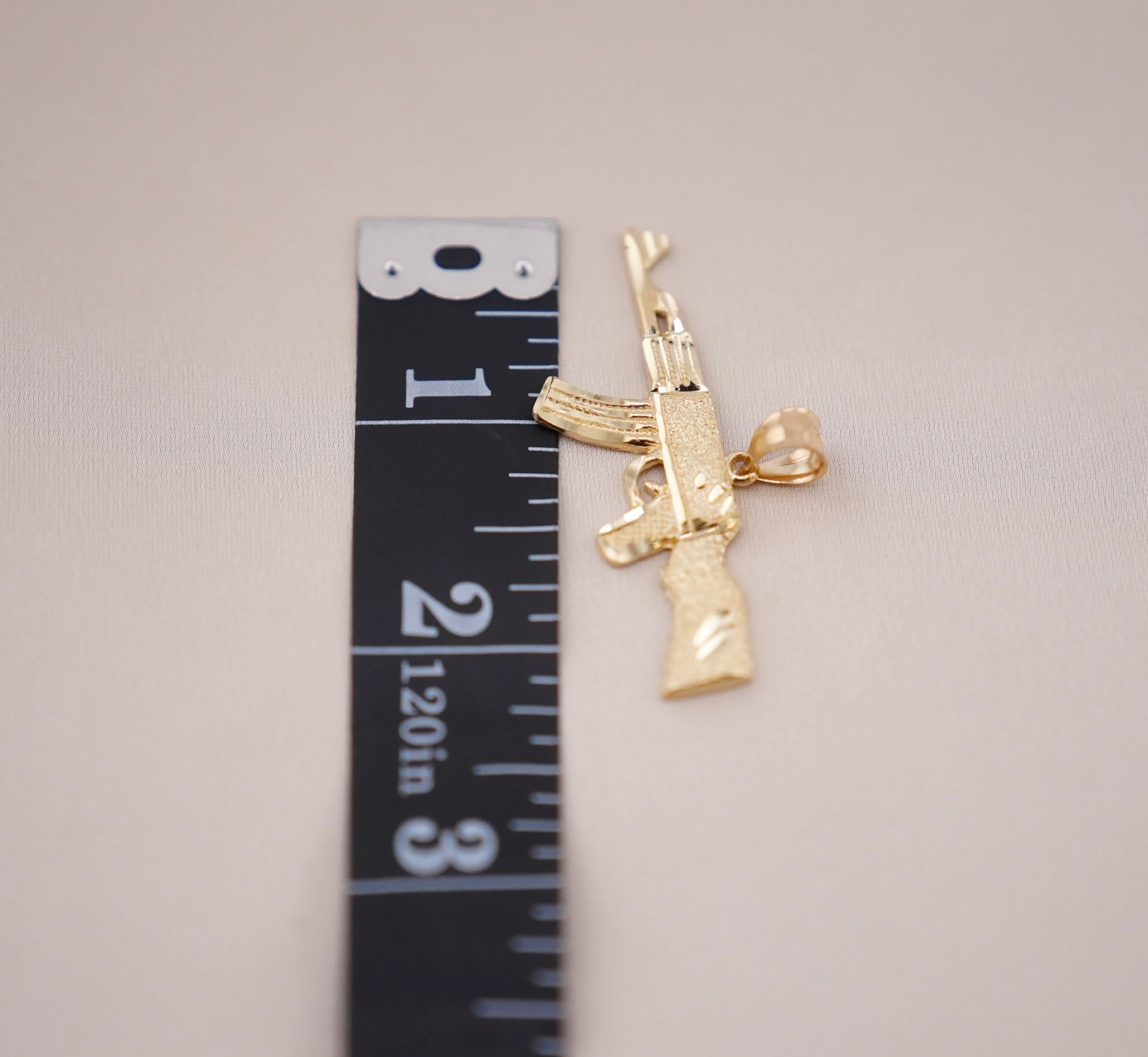 14k Gold Gun Pendant
